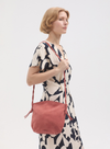 Braided Handle Crossbody Bag in Salmon Pink from Nice Things