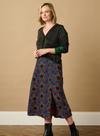 Arya Cardigan in Black, Green Star Cuff from Sugarhill