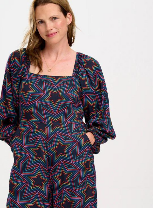 Hestia Shirred Jumpsuit in Black Rainbow Star Explosion from Sugarhill