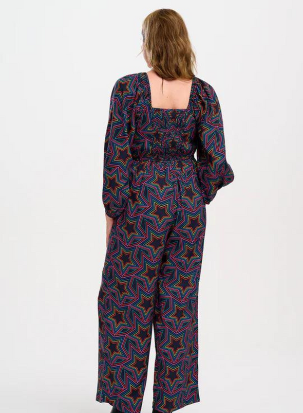 Hestia Shirred Jumpsuit in Black Rainbow Star Explosion from Sugarhill