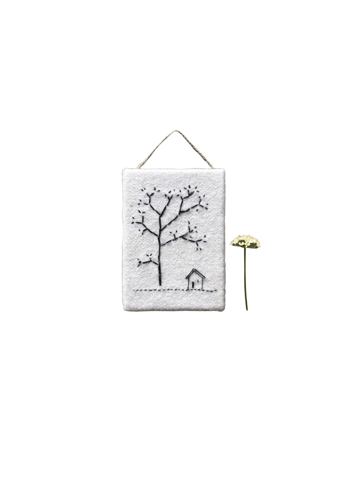 East of India Thread hanger House under tree