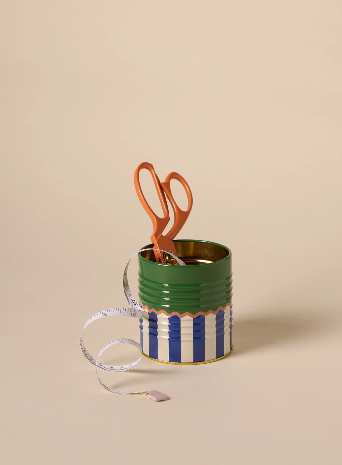 A Dopo Solid & Striped Storage Tin from Paddywax