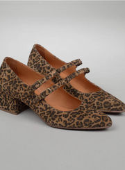 Esska Laura Low Leopard Heels against a grey background. Close up side shot of pair showcasing the buckle straps and leopard suede detail.