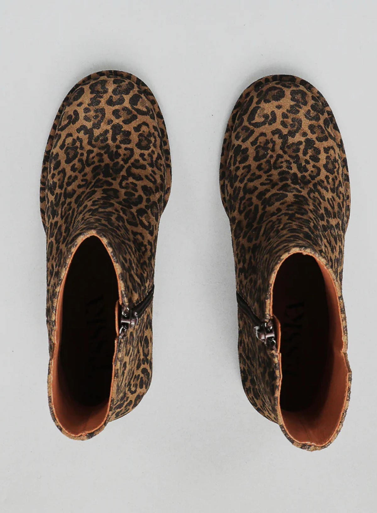 Pair of Esska Mona Leopard Print Boots on a grey background. Overhead shot showcasing the round toe shape of these block heel ankle boots.