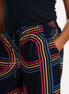 Ameera Wide Leg Trousers in Black, Retro Racer from Sugarhill