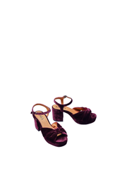 Pair of Esska Chilli Aubergine Velvet Heels against a white background. Front and side shot showcasing the block heel and the open toe with bow. 