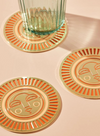 Sol Coaster in Peachey Orange from Cai & Jo