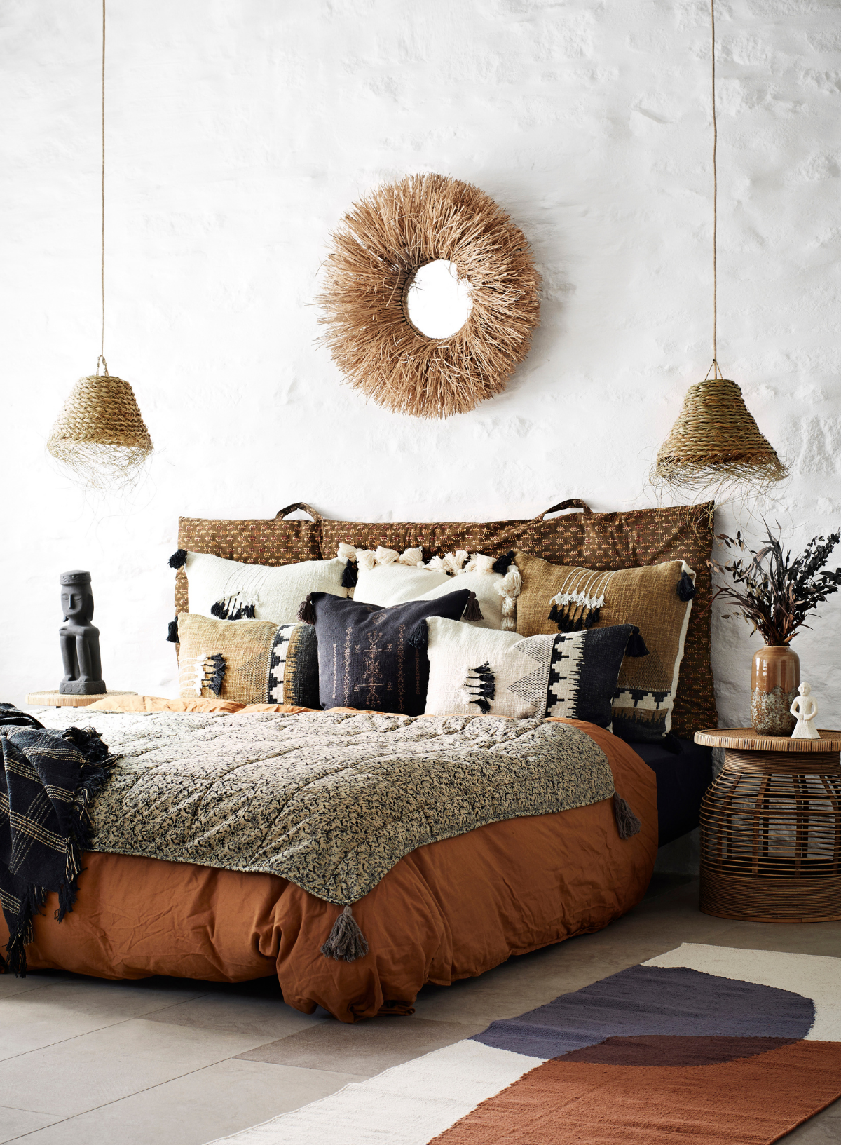 Native Printed Cushion With Tassels Tapernade & Black from Madam Stoltz